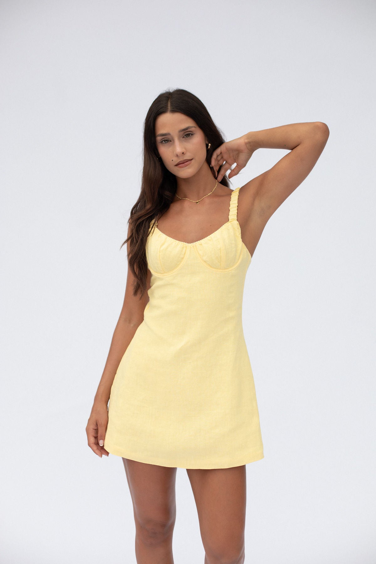 Butter yellow mini summer dress with straps, fitted waist and bust. Designed by Zarfie. Made with linen and cotton.